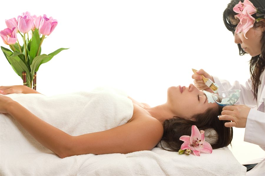 Woman receiving a facial
